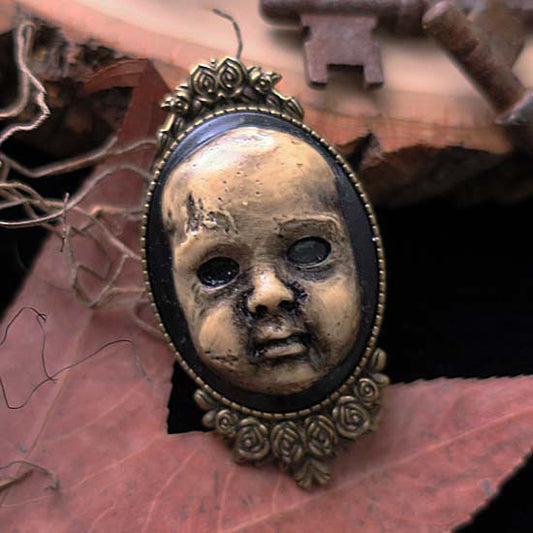Creepy Doll - Brooch - antique brass