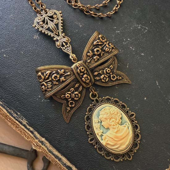 FLORAL BOW Necklace with Greek Goddess cameo - antique brass