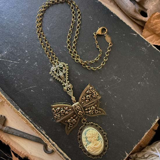 FLORAL BOW Necklace with Greek Goddess cameo - antique brass