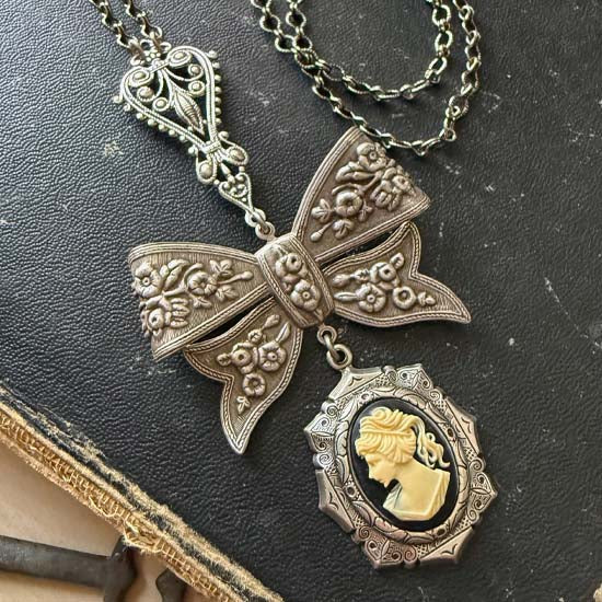 FLORAL BOW Necklace with Maiden cameo - antique silver