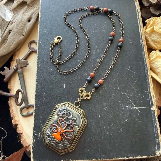 SHIPWRECKED Necklace - brass w/orange