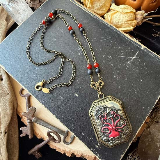 SHIPWRECKED Necklace - brass w/red