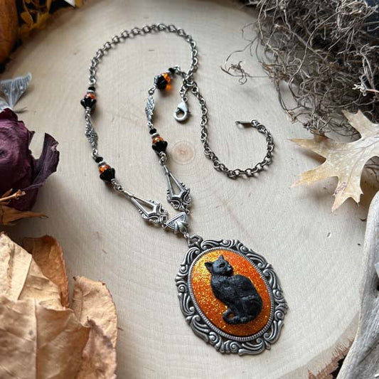 BLACK CAT Necklace - large w/orange glitter - antique silver