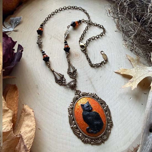 BLACK CAT Necklace - large w/orange glitter - antique brass