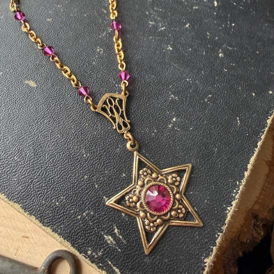 FUCHSIA STAR Necklace - antique brass