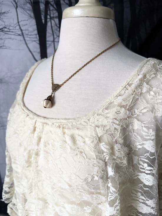 Ghostly Pumpkin Patch Necklace - antique brass
