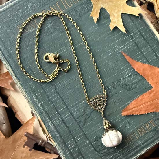 Ghostly Pumpkin Patch Necklace - antique brass