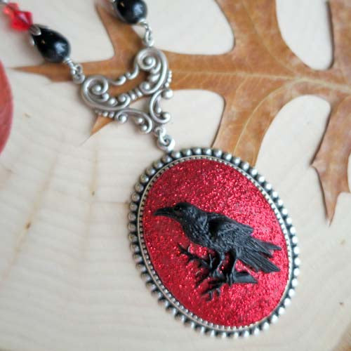 The Raven  - Necklace with red glitter
