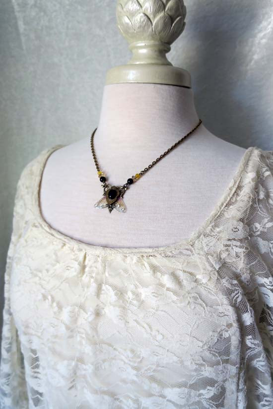 WEE WINGS Necklace - brass with Onyx