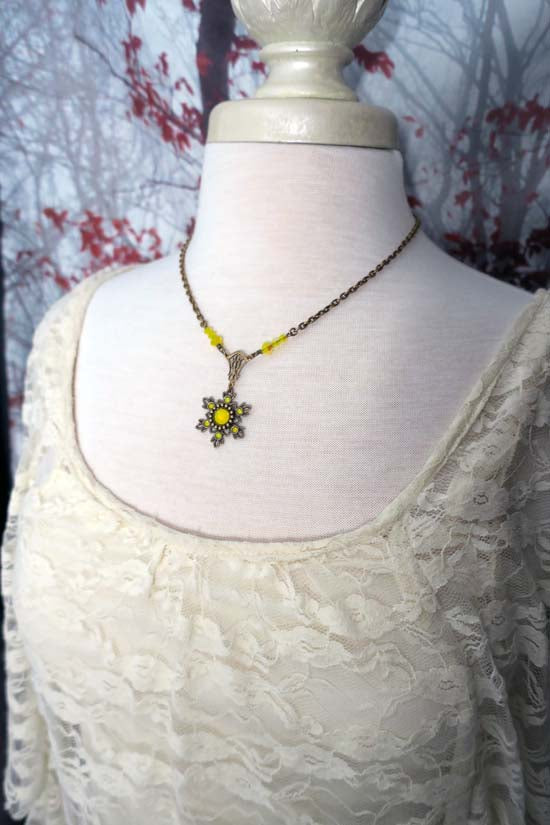 Flurries Collection - "Don't Eat the Yellow Snow" Necklace - antique brass